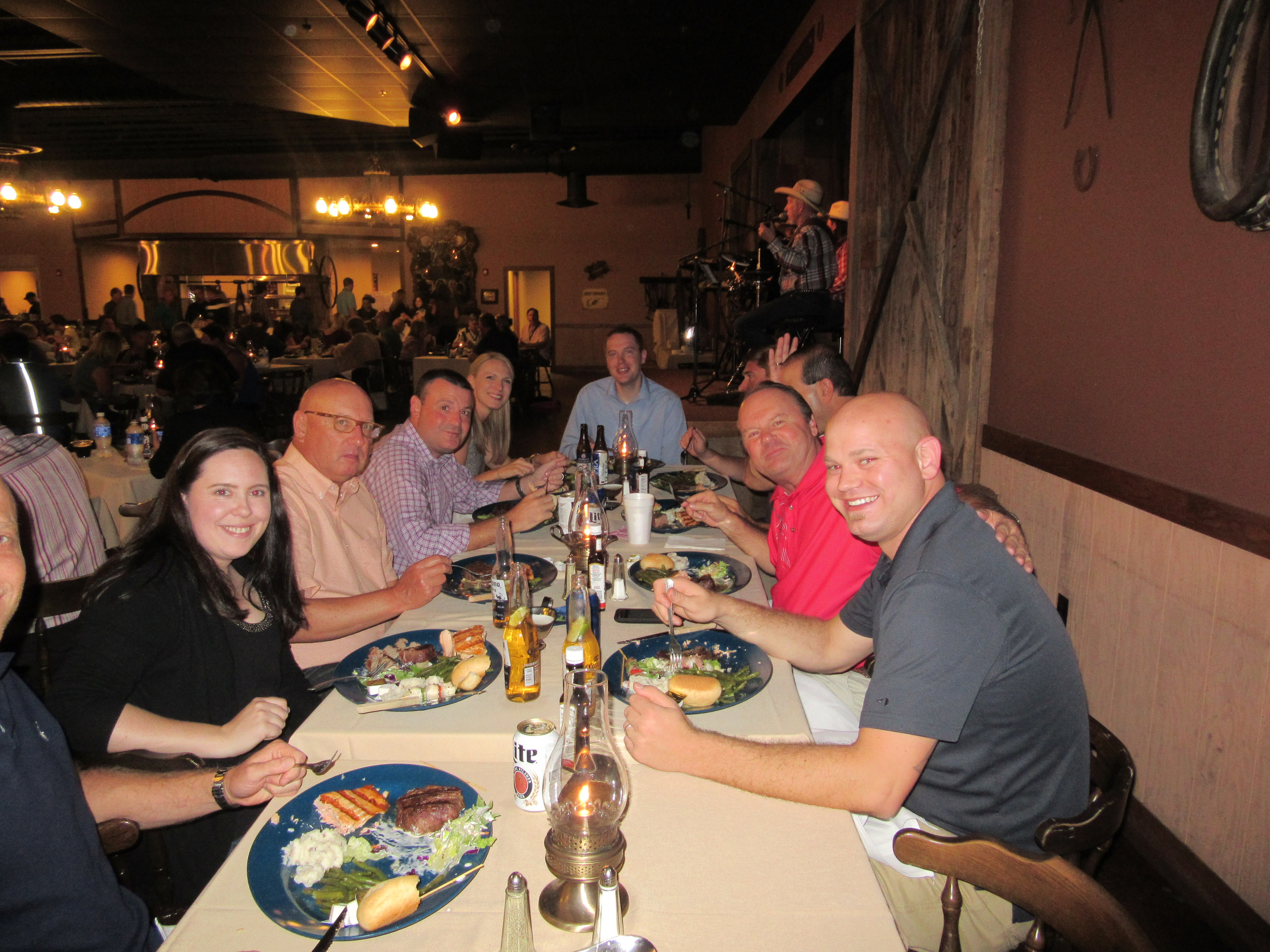Event attendees enjoying an offsite dinner at the Rawhide Steakhouse.