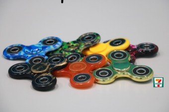 Fidget spinners (like these sold at 7-Eleven) wre among the hottest impulse items this past year. Retailers are now looking for the next hot product.